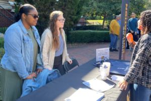Teacher Education Fellows assist at a UNCG Open House in the fall of 2022