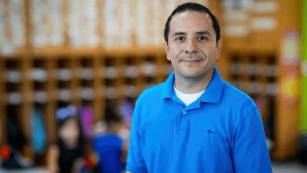 Jhonatan Marin Mesa, Guilford County Schools Teacher of the Year, stands in his classroom