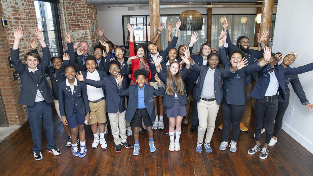 Dr. Oakley celebrates with students from Allen Jay Preparatory Academy during her one-year anniversary celebration, held at Congdon Yards in High Point on September 1, 2023. Photo by Toni Shaw.