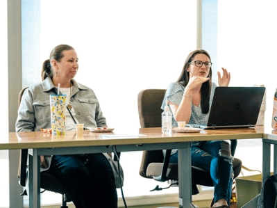 SES Ph.D. students at an iBelong event