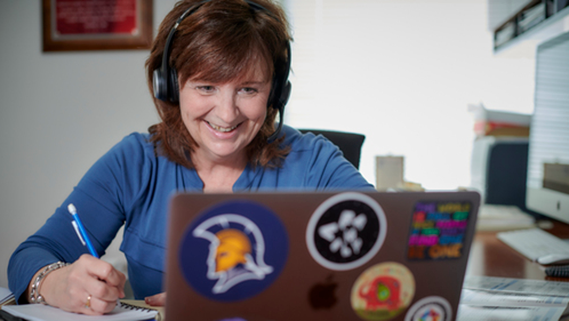 School of Ed professor Marcia Rock working with off site student teacher.