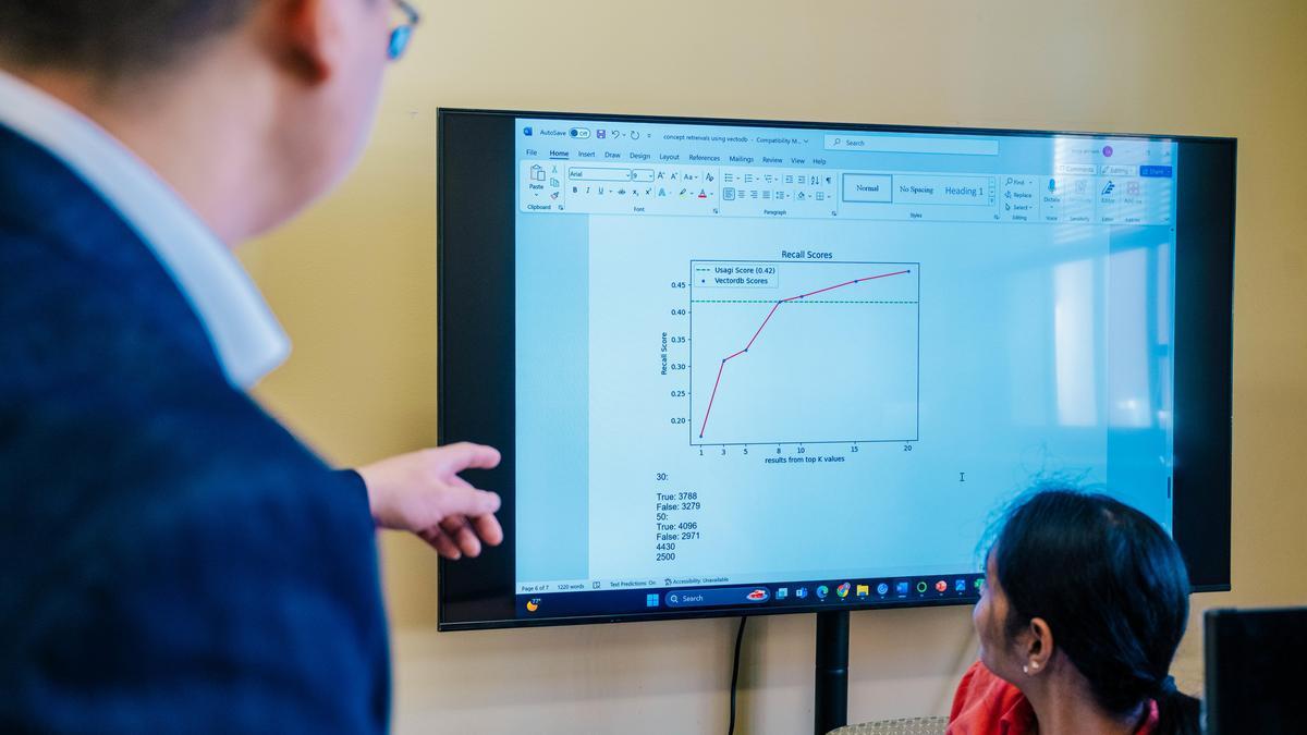 Man pointing at a screen