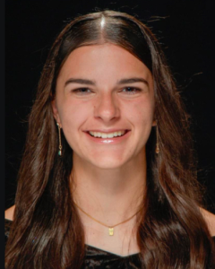 Head shot of Megan Fongemy in front of a black background